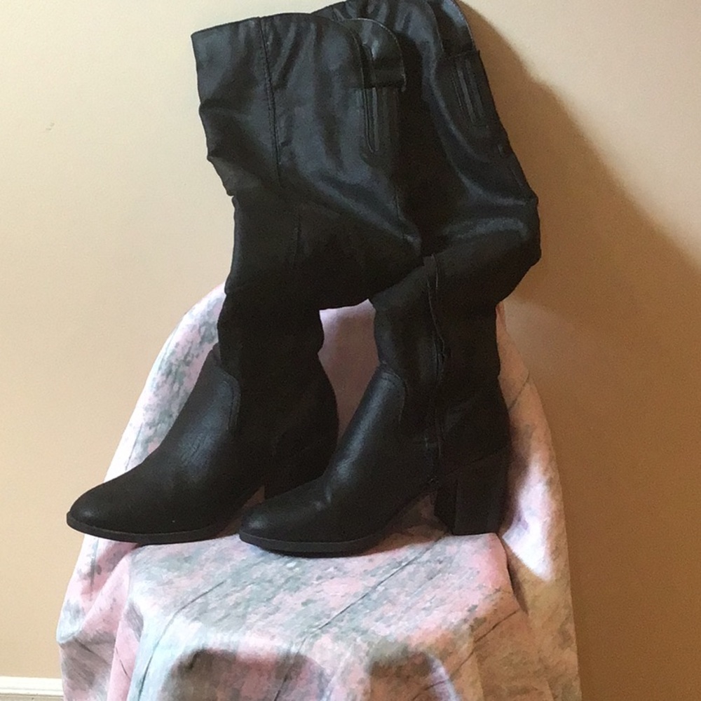 Black over the knee boots.